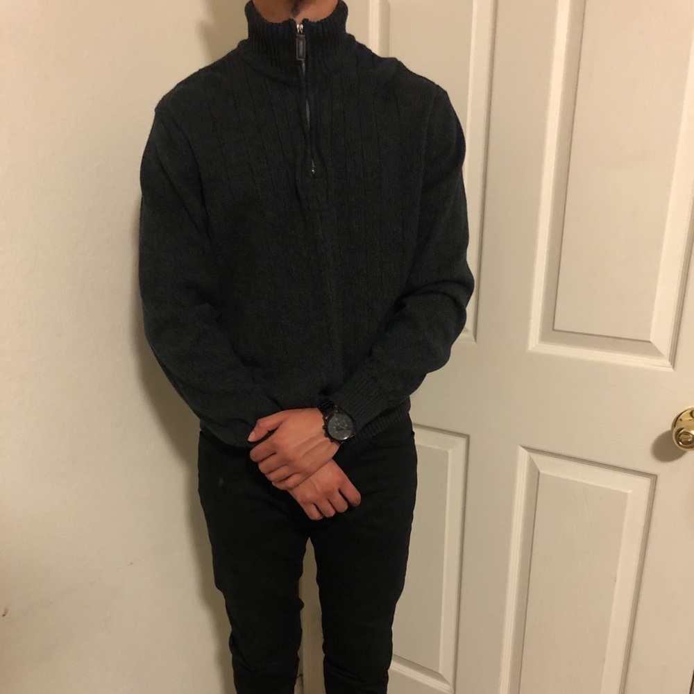 Dark gray turtle neck.